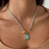eclipse charm necklace