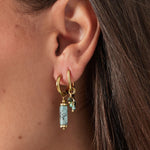 earring with black beads