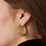 drop shaped earrings with stones