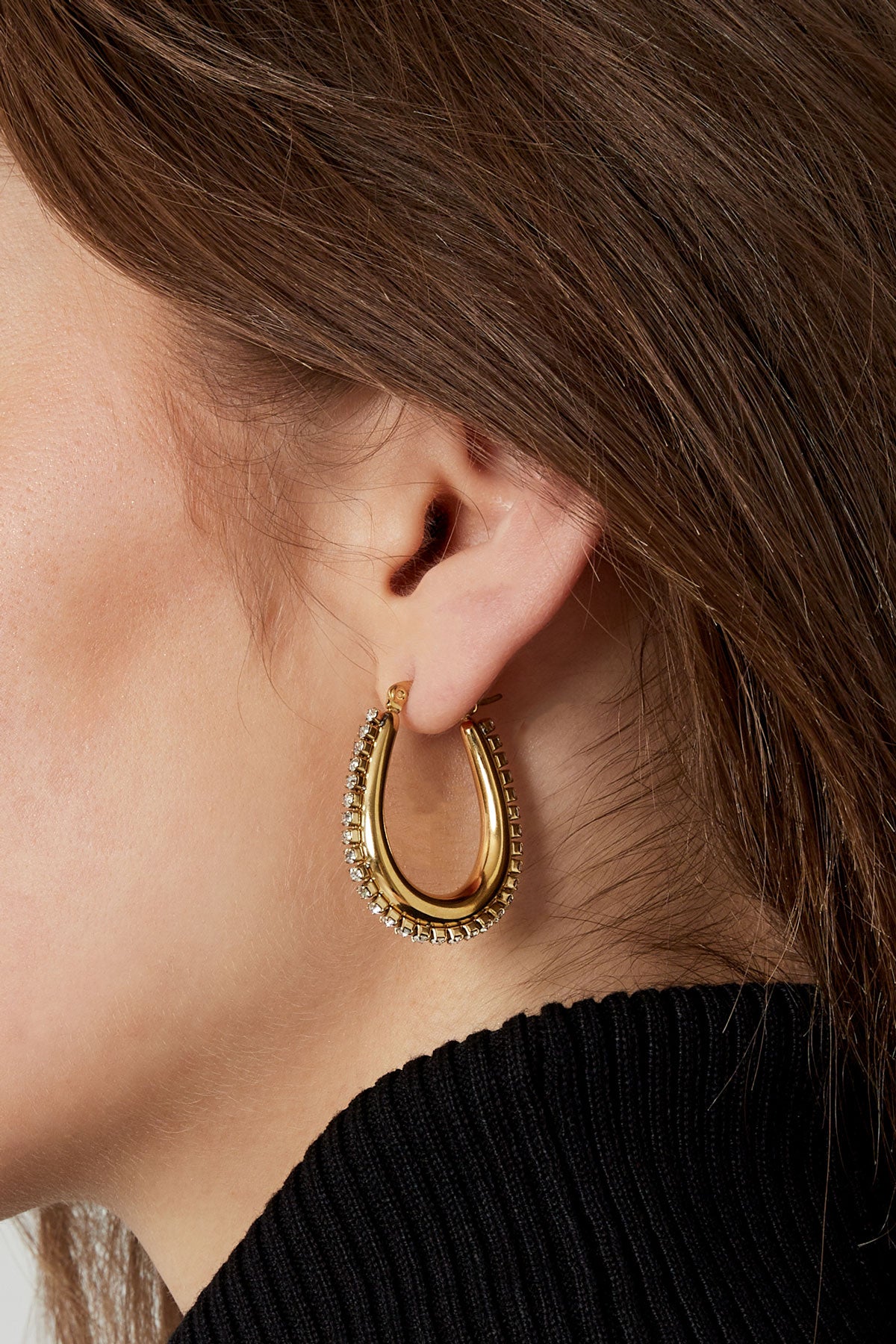 drop shaped earrings with stones