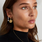 earring with cute flower pendant
