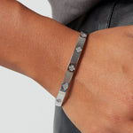 slave bracelet with clovers and stones