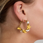 Hoop earrings with starfish and gold beads