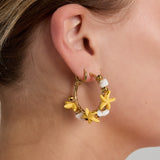 Hoop earrings with starfish and gold beads