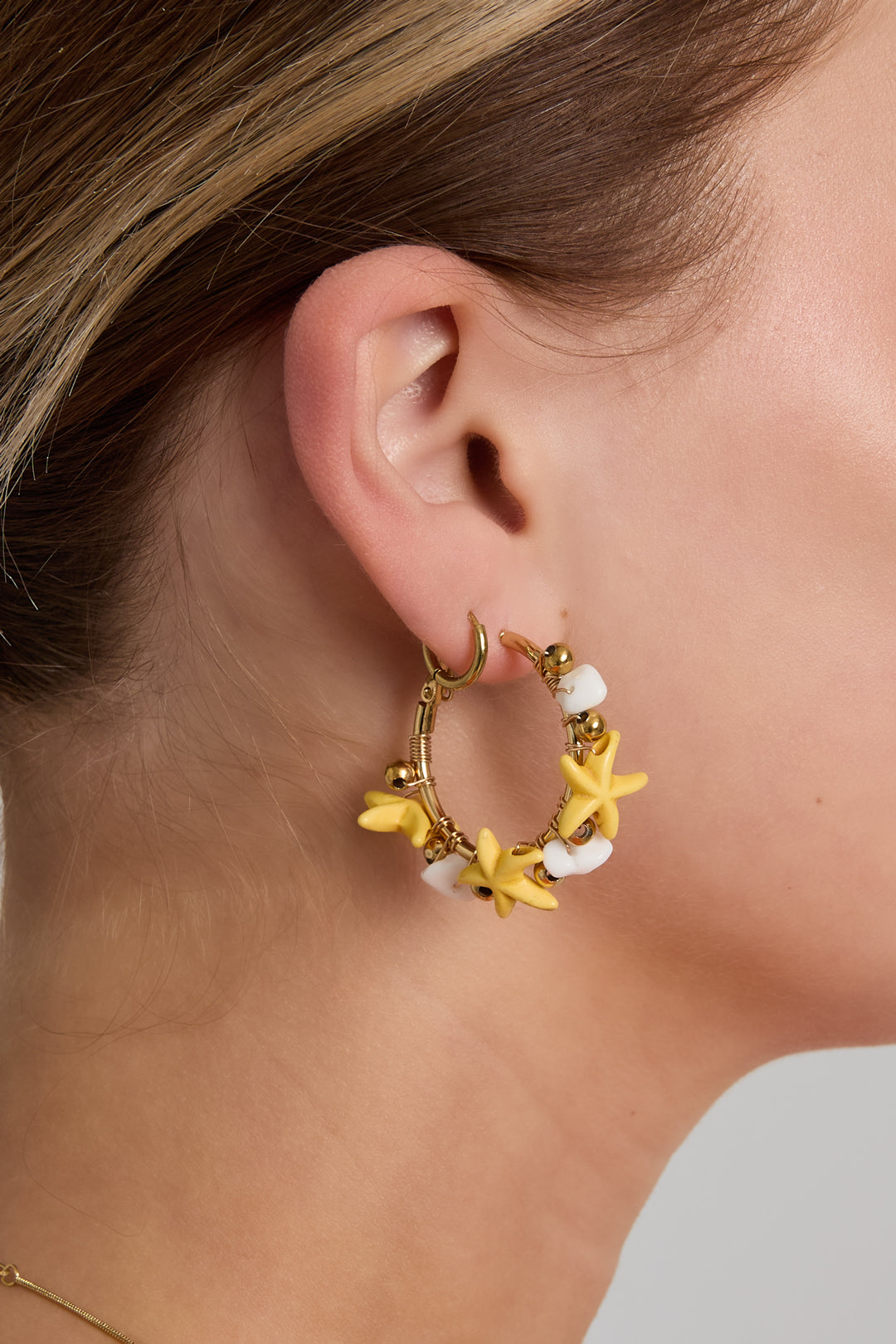 Hoop earrings with starfish and gold beads