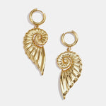 Small hoop earrings with large twist shell charm