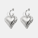 Earrings with large hanging heart