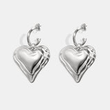 Earrings with large hanging heart
