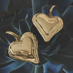 Earrings with large hanging heart