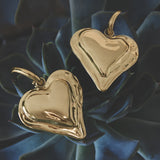Earrings with large hanging heart