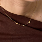 Necklace with beads and hearts with stone