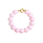 Bracelet with large beads and clasp at the front