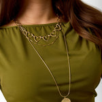 Necklace with flat details and large pendant