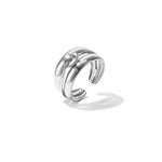 Layered ring with minimalist twisted detail
