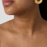 Statement earrings in a donut shape