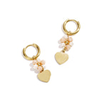 Earrings with heart on beaded flower