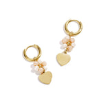 Earrings with heart on beaded flower