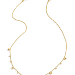 Necklace with alternating balls