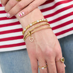 Bangles with hanging flower charm