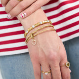 Bangles with hanging flower charm