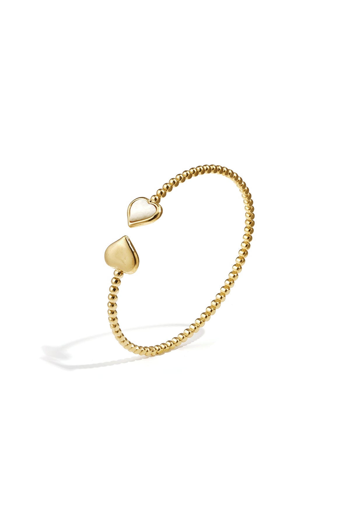 Symmetrically dotted bangle with detailed ends