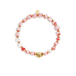 Beaded bracelet with heart-shaped centerpiece
