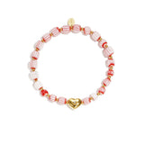 Beaded bracelet with heart-shaped centerpiece