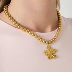 8mm hollow bead necklace with a flower