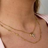 Necklace with cross and star charms