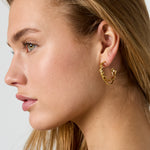 Double hoop earrings with twist