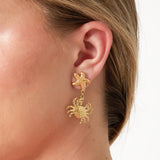 Dangling starfish earrings with crab