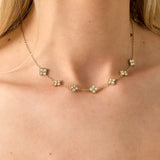 Necklace with zirconia-set clovers