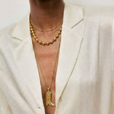 Long necklace with cowboy boot