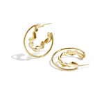Double hoop earrings with twist