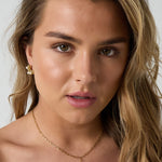 Necklace with hanging heart and pearls
