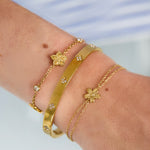 Bracelet with double chain and small flower