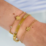 Bracelet with double chain and small flower