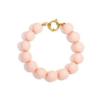 Bracelet with large beads and clasp at the front
