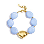 Beaded bracelet with organically shaped statement bead