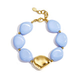 Beaded bracelet with organically shaped statement bead