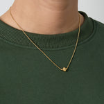 Minimalist necklace with a clover