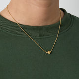 Minimalist necklace with a clover