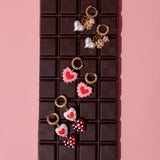 Earrings with heart in candy motif