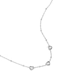 Necklace with beads and hearts with stone