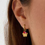 Earrings with hanging flower and beads