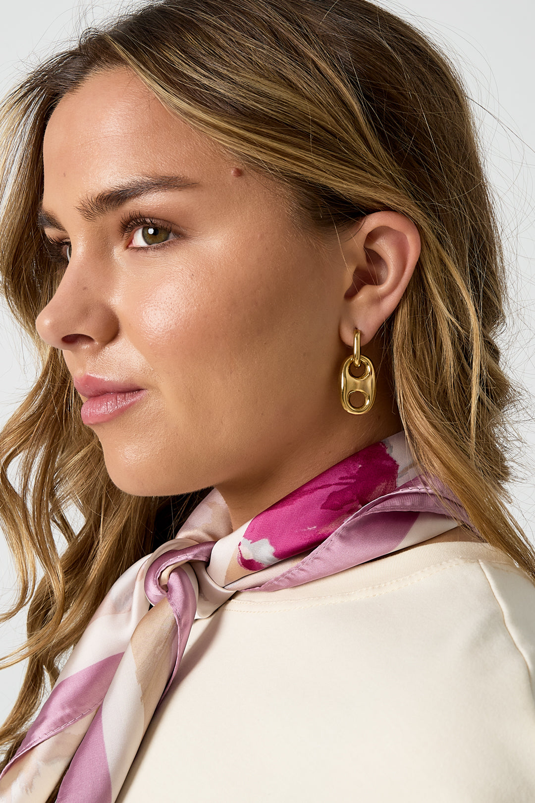 Earrings with button detail