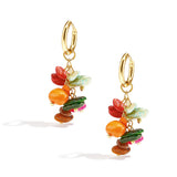 Small hoop earrings with dangling stones and beads