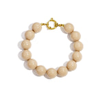 Bracelet with large beads and clasp at the front