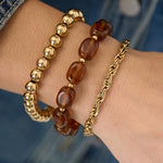 Bracelet set with asymmetrical beads
