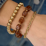 Bracelet set with asymmetrical beads